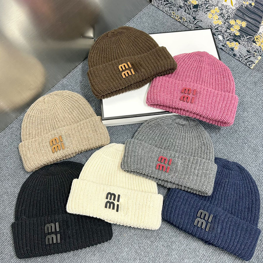 Designer for men and women couples Winter travel outdoor warm loose woolen hat Thick needle stripe knitted cold hat-image-929281111