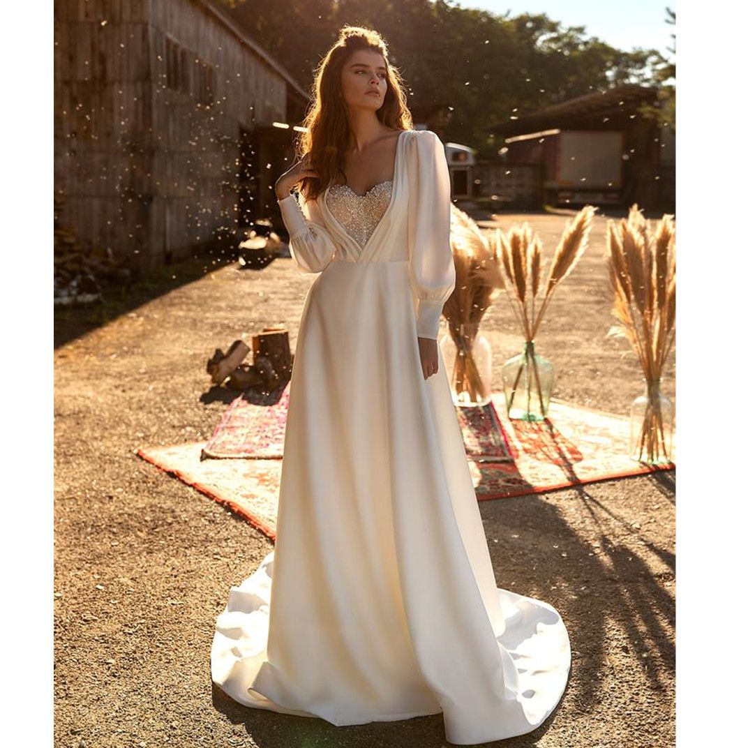 Robe de mariée à manches longues plage femmes illusion appliques en dentelle en V