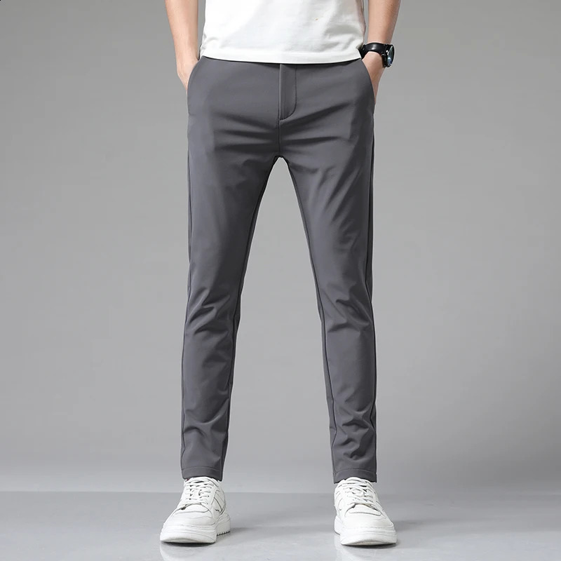 Autumn mediumsized business elastic slim fit waist mens casual pants for runners Korean classic blue black gray style 240921