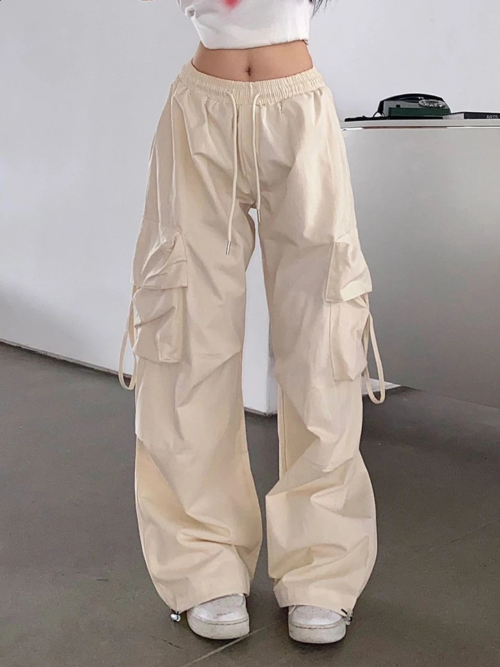 Pantalon de cargaison à taille en taille avec des femmes avec des poches à la mode à la mode Streetwear Y2K Spring / été pantalon de jambe large