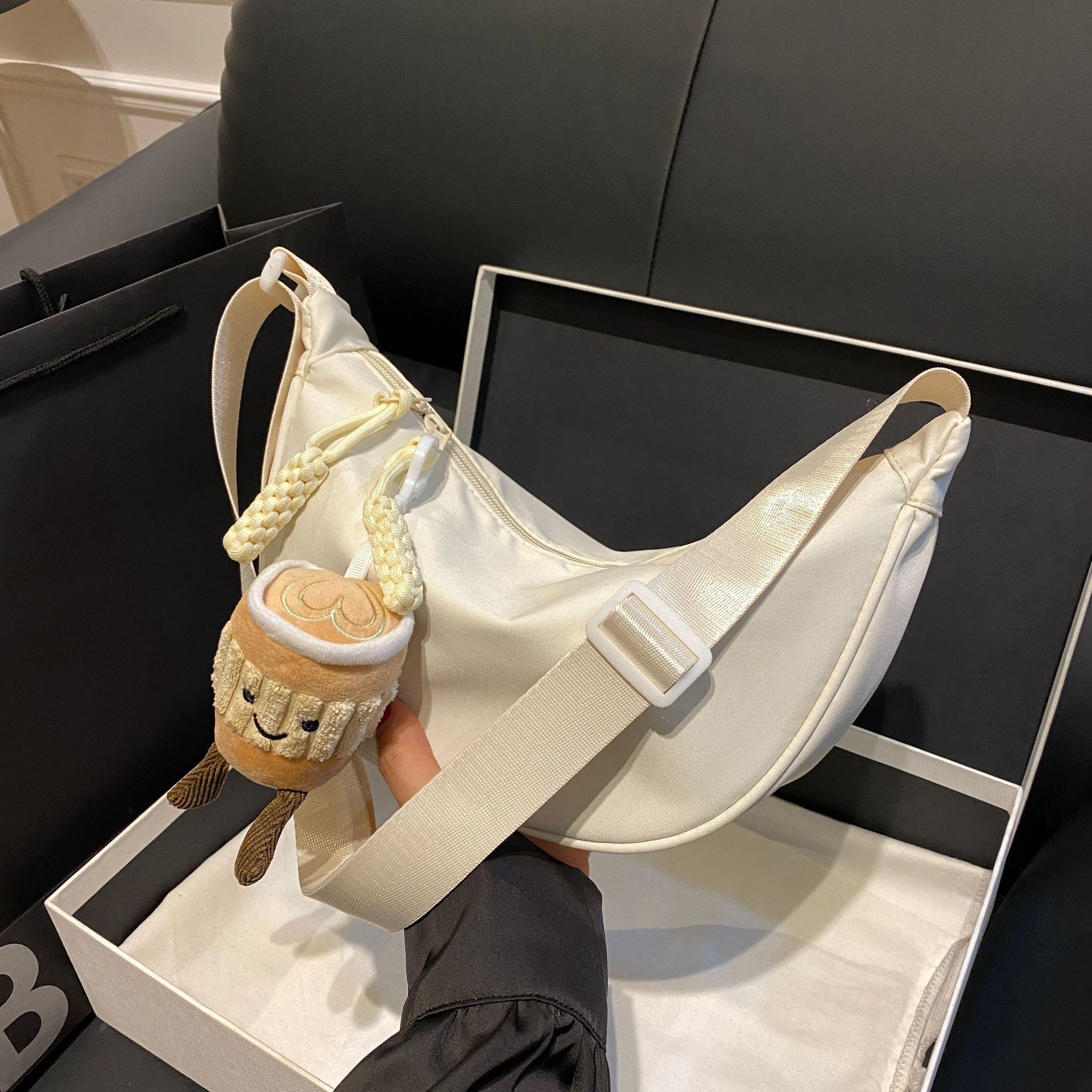 New designer casual trend single shoulder handbag slanted dumpling crescent bag for women s spring and summer nylon commuting