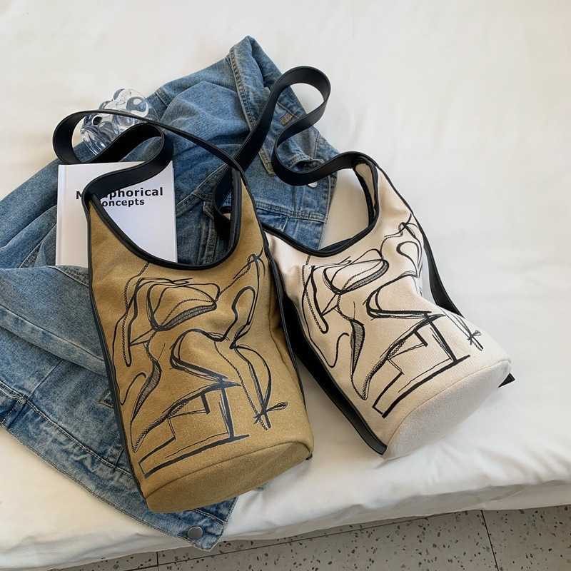 Sac de seau de mode sac pour femmes Version coréenne artistique sac à bandoulière Tendance de style graffiti polyvalent