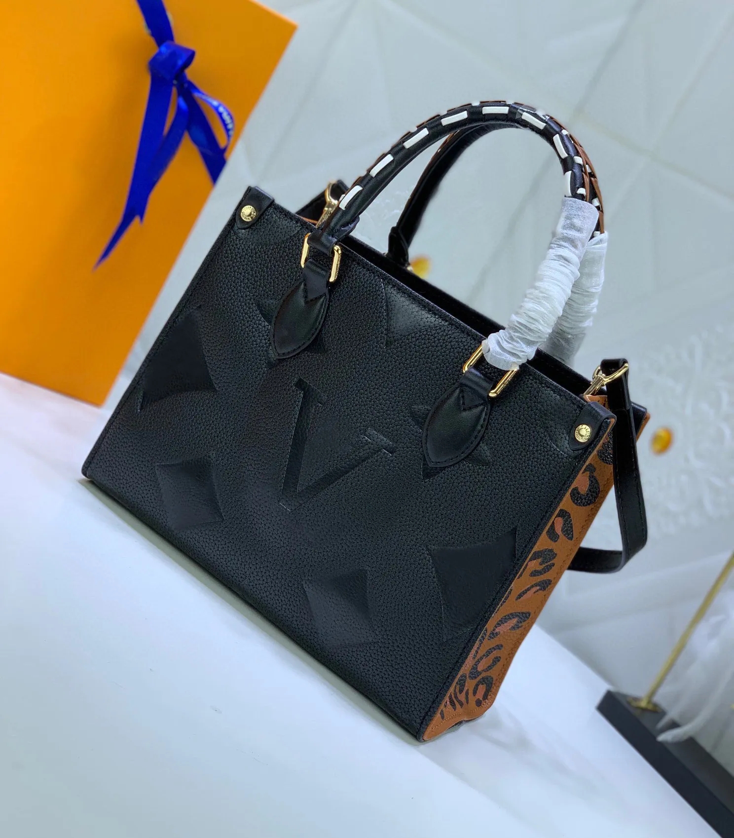 Fashion Leopard onthego Femmes Luxurys Designers Sacs Vérineurs en cuir sacs à main messager Crossbody Body Sac Totes portefeuille sac à dos