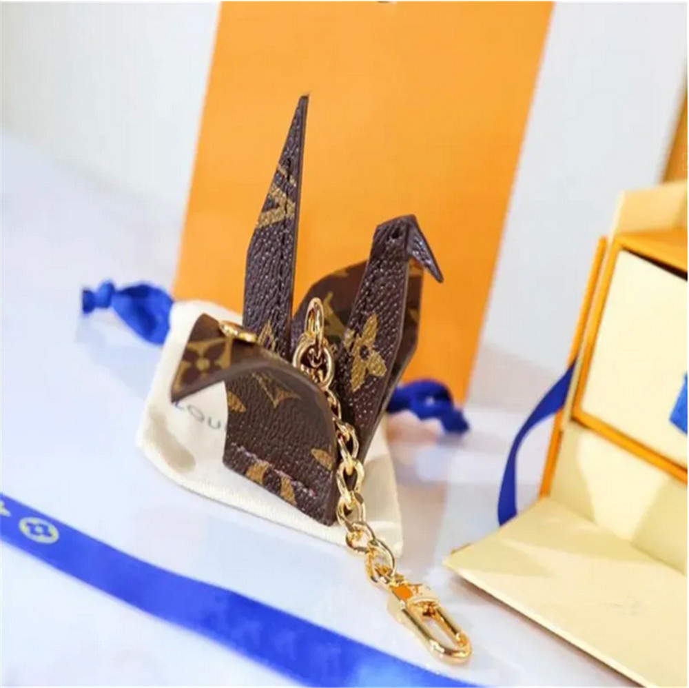Cartoon animal thousand paper cranes Creative key chain accessories Key chain PU leather letter pattern car keys-image-938008744