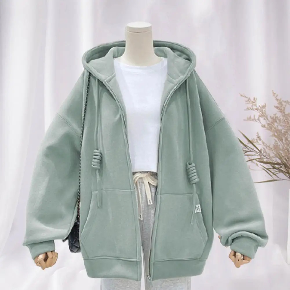 Veste de femmes d'automne et d'hiver Couleur solide à capuche à fermeture éclair chaud grande poche décontractée temps froid 240802