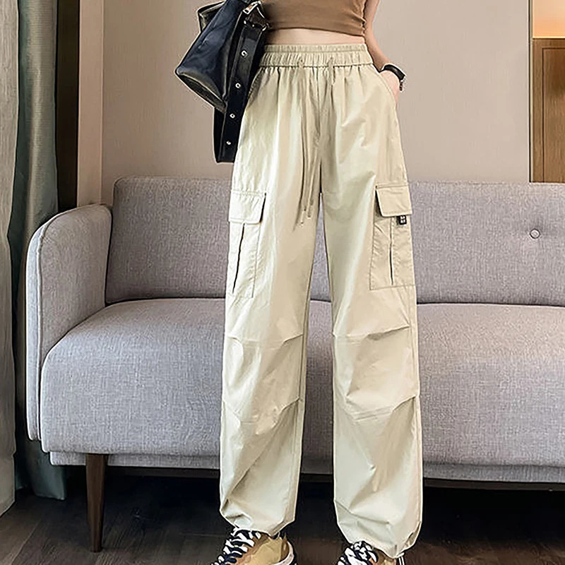 Étirement des grandes poches à taille haute pantalon de cargaison décontractée à pattes lâches pour les femmes 240806