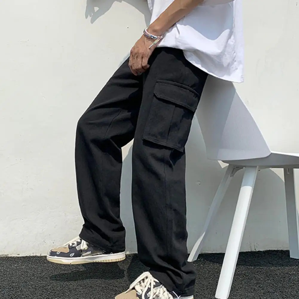 Men de cargaison Pantalon de couleur solide de style hip-hop en vrac multiples multiples élastiques