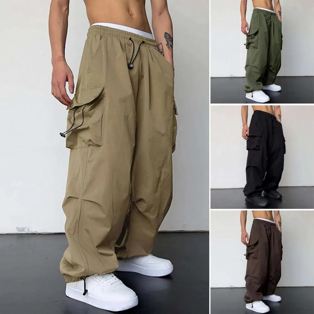 Hommes streetwear printemps harem pantalon décontracté masculine pantalon de cargaison de couleur de couleur de taille élastique multi-poche pant