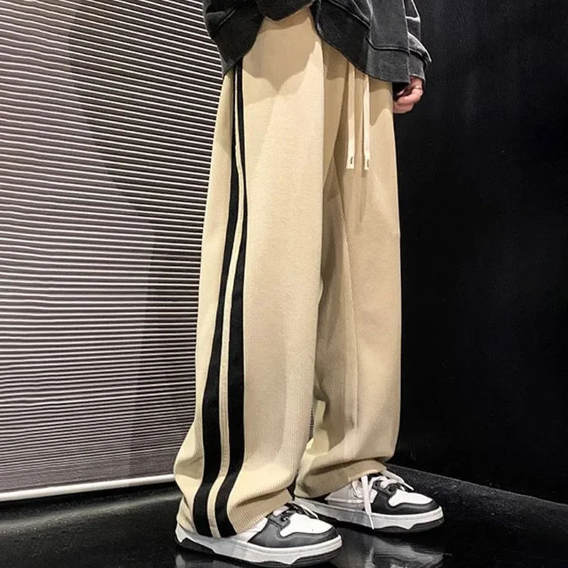 Men de style coréen décontracté salopes lâches pantalons masculins