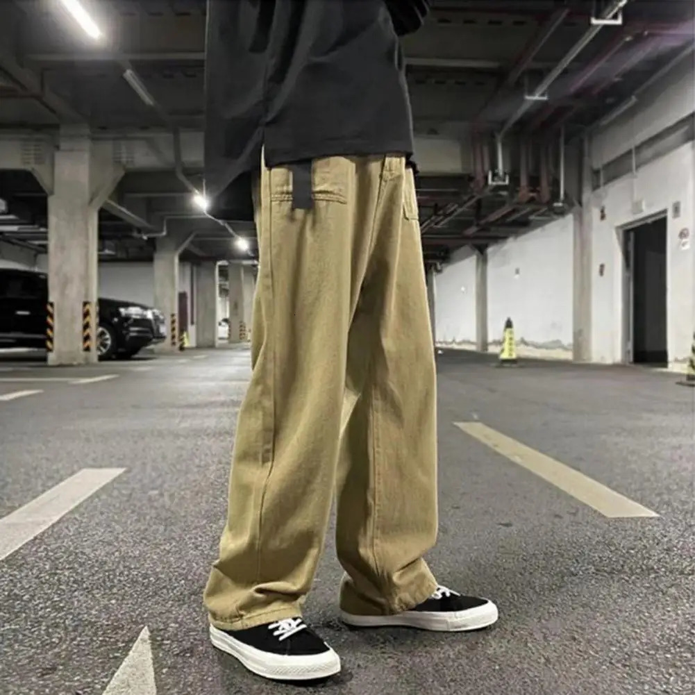 Pantalon de cargaison pour hommes Couleur continue Retro Japonais Style High Street Wide Jam Le jambe droite Pocket Street Wear Pants 240807