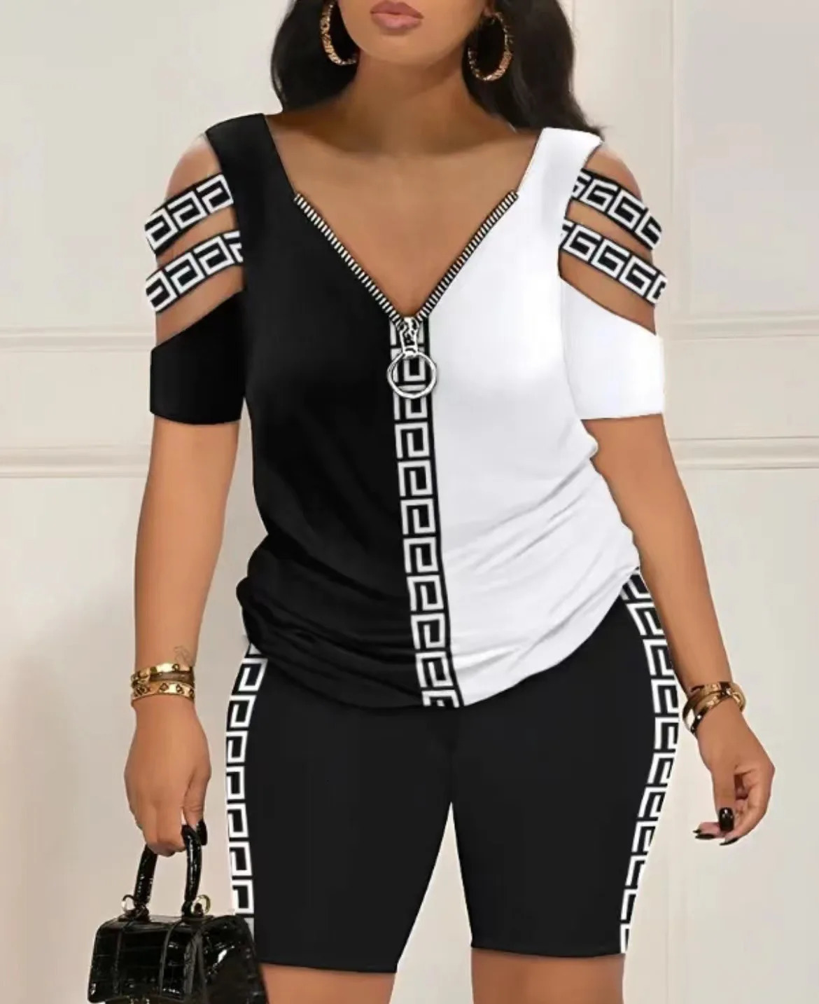 T-shirts à imprimé lâche décontracté set en deux pièces pour les femmes mode sexy creux en t-shirt et short 2 pièces sets de femmes tenue d'été 2