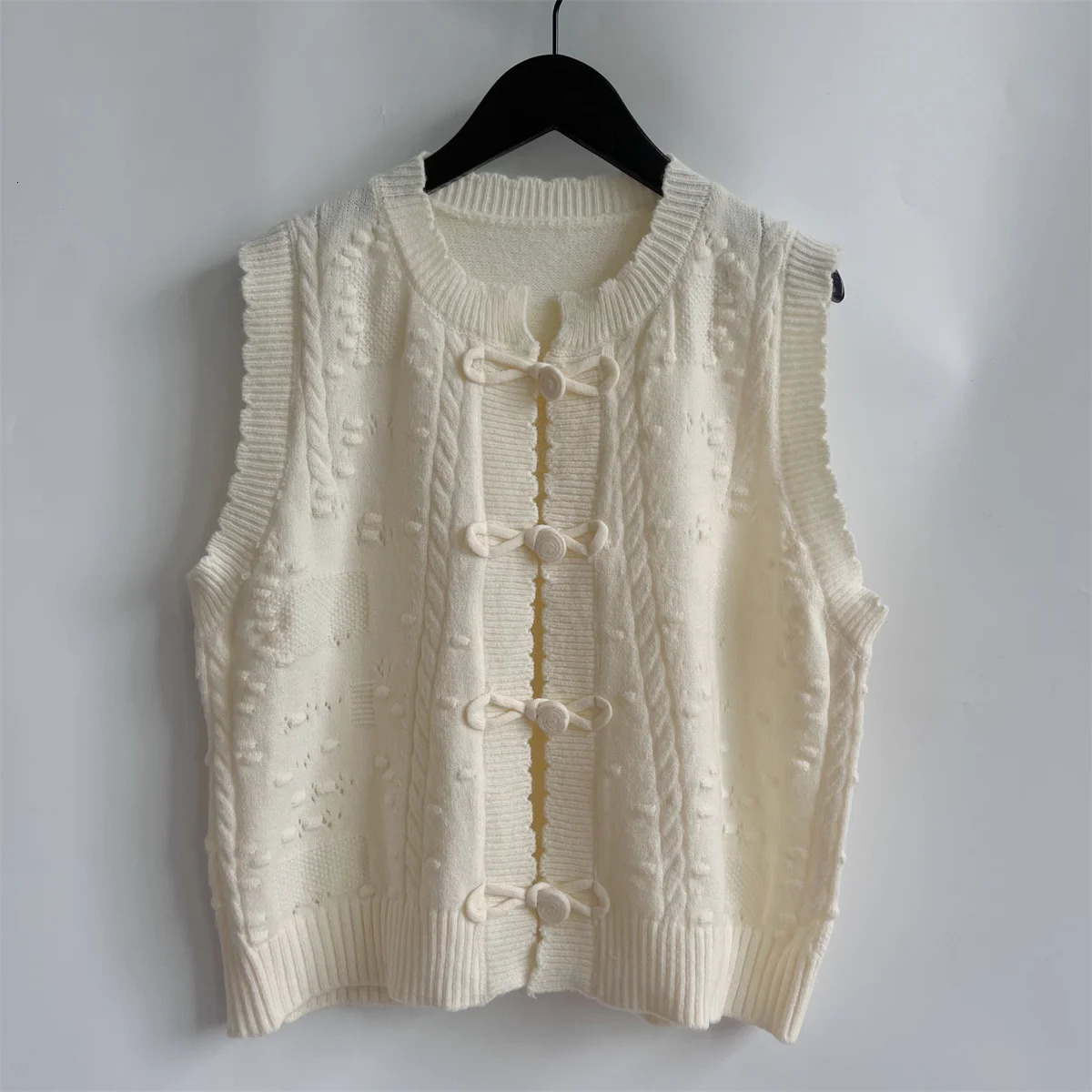 Style chinois coréen tricoté gilet printemps o cou torsion élégant gaiat femme décontracté cardigan blanc lâche 240808