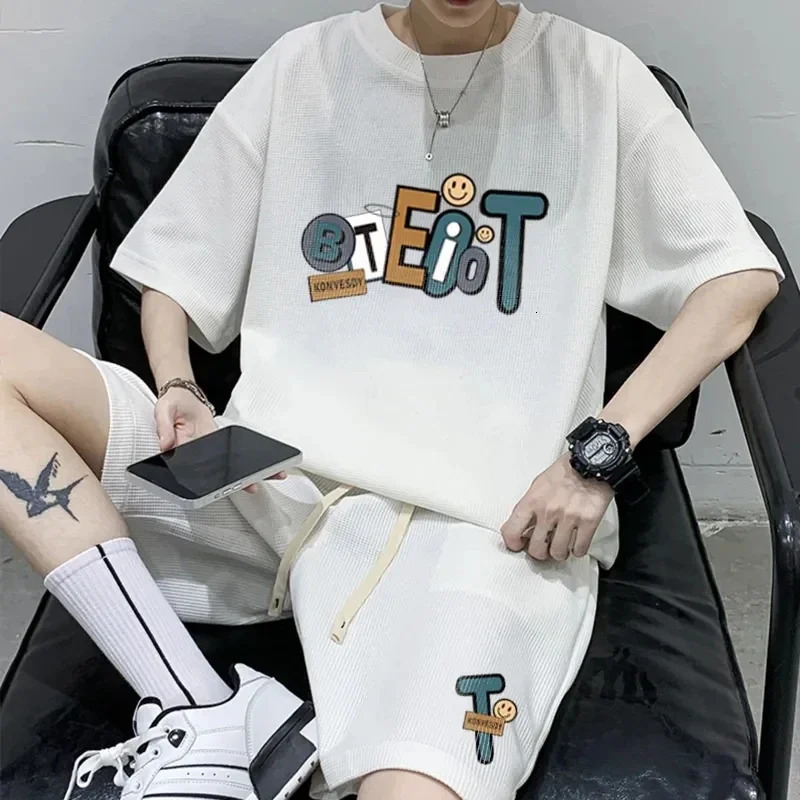 Summer surdimension décontracté survasse de survêtement lâche jogging waffle costume hommes lâches tshirt à manches courtes short sportif 2pcs se