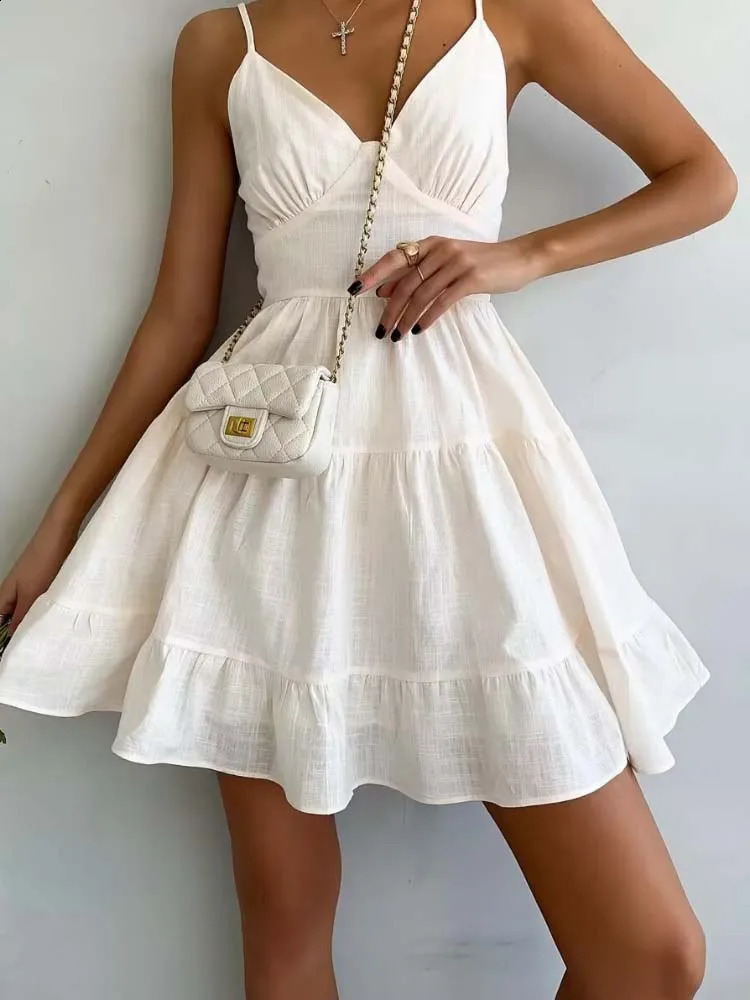 Robe d'élingue élégante Femmes sexy V-cou mini-robe Summer Fashion White Sans manches A-Line Robe Lady Vintage Vinth Vest Sundren 240810