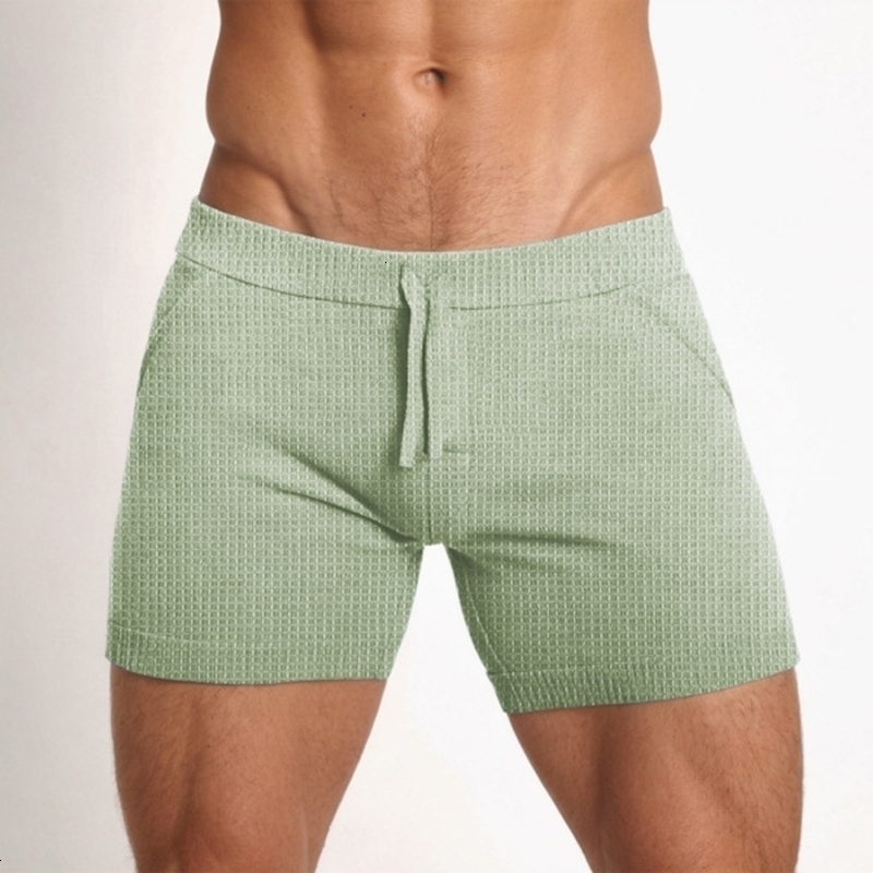 Taille brossée décontractée Shorts minces élastiques pour hommes Couleur solide sexy Waffle Short respirant Summer Hers Shorts240810