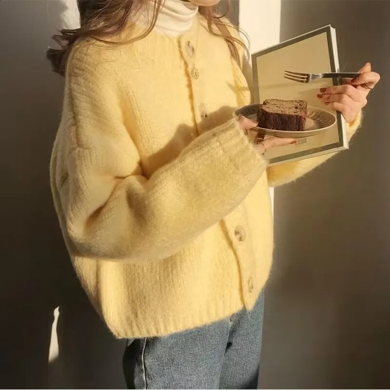 Élégant tricot tricot top femme coréen de printemps d'automne cardigan doux pull rose décontracté arc de coulées de boulettes