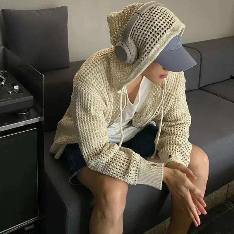 Les pulls minimalistes d'automne aux hommes à capuche à capuche épissée creux de cordon de street à la mode