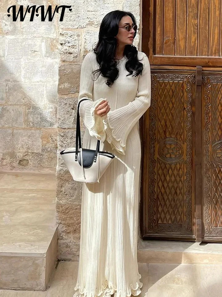 Élégant vol en tricot à lacets Longue robe Femmes Loose O-cou Backless Sans manches plissées