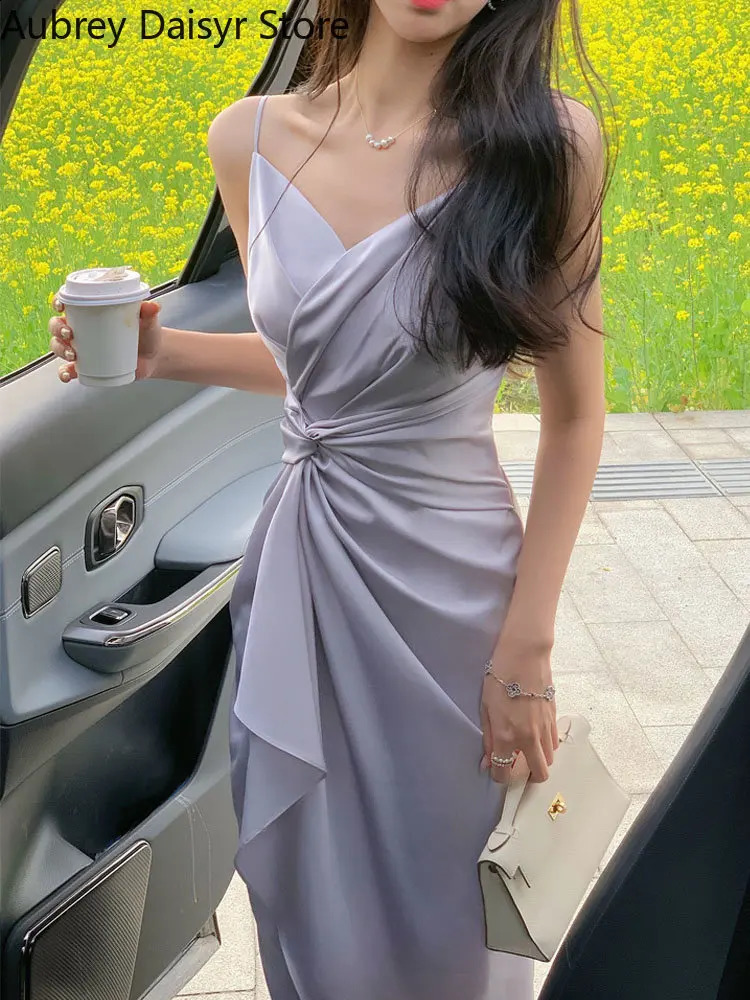 Robe midi sans manches émouvchée sexy Femmes Élégantes Robes formelles irrégulières Robe de plage décontractée le soir Robe 240815