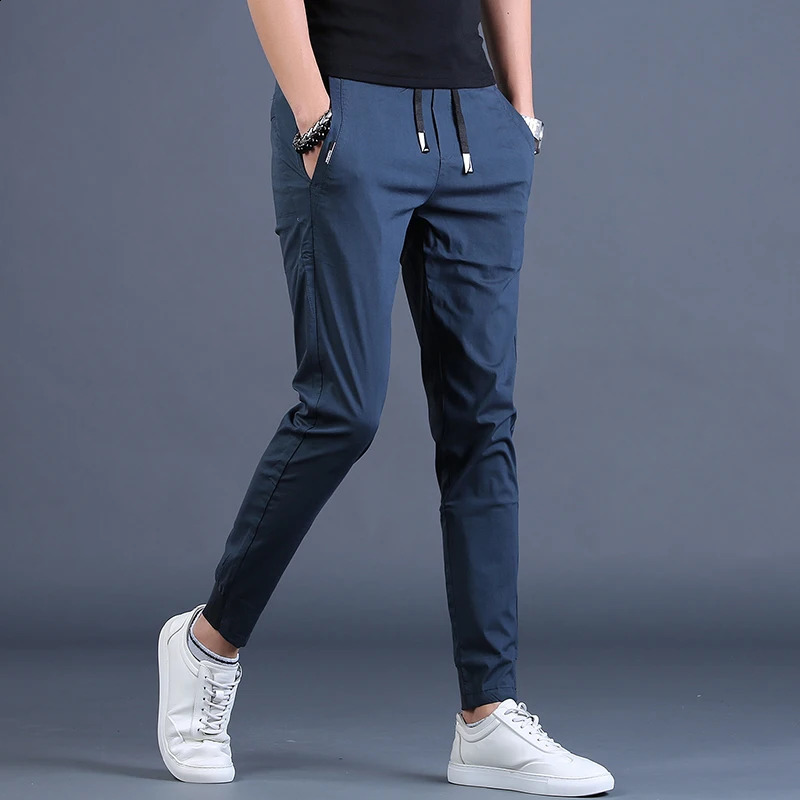 Pantalons sportifs décontractés d'été Fashion Fashion Corée de style coréen Blue Slim Fit Trawstring pantalon 240819
