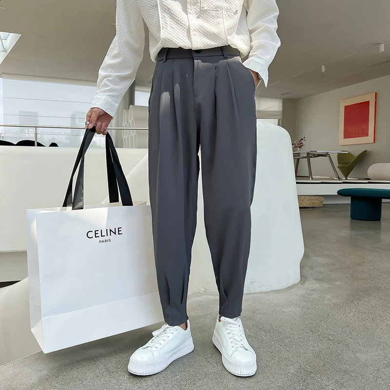 Pantalons de la mode printemps d'été Men Affichez le pantalon à fente du bas de style coréen de style coréen