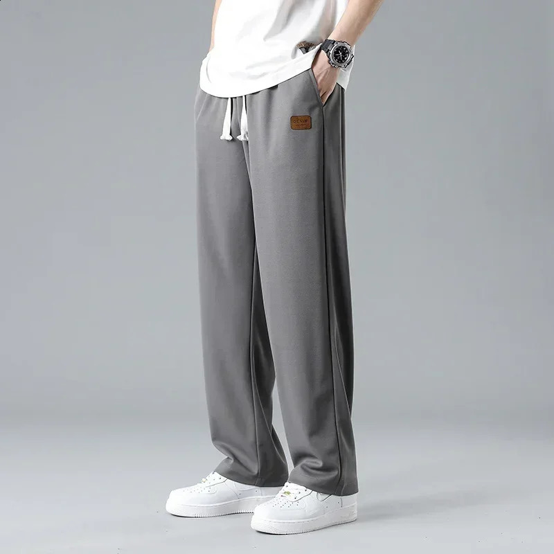Les hommes d'été décontractés en ligne droite respirante pantalon décontracté mince de style coréen fashion sportive oversize 240820