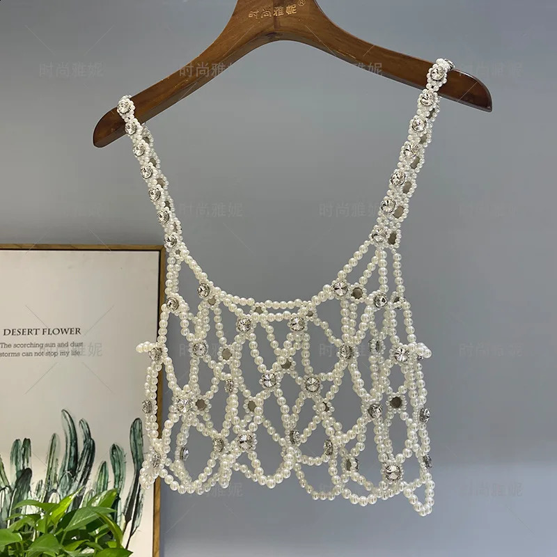 Tank top perle creux en diamant de mode diamant tops spaghetti caméns de style français femelle sans manches dropship tout-puissant 240821