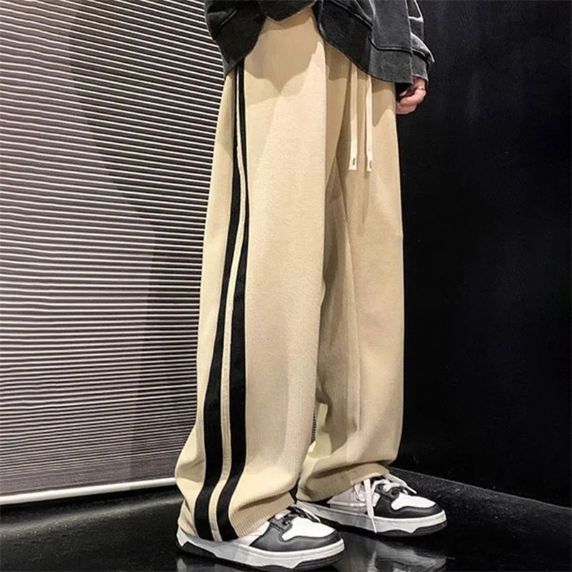 Men de style coréen décontracté salopes lâches pantalons masculins pantalon wideleg pantalon masculin oversize harem plus taille s3xl y240822