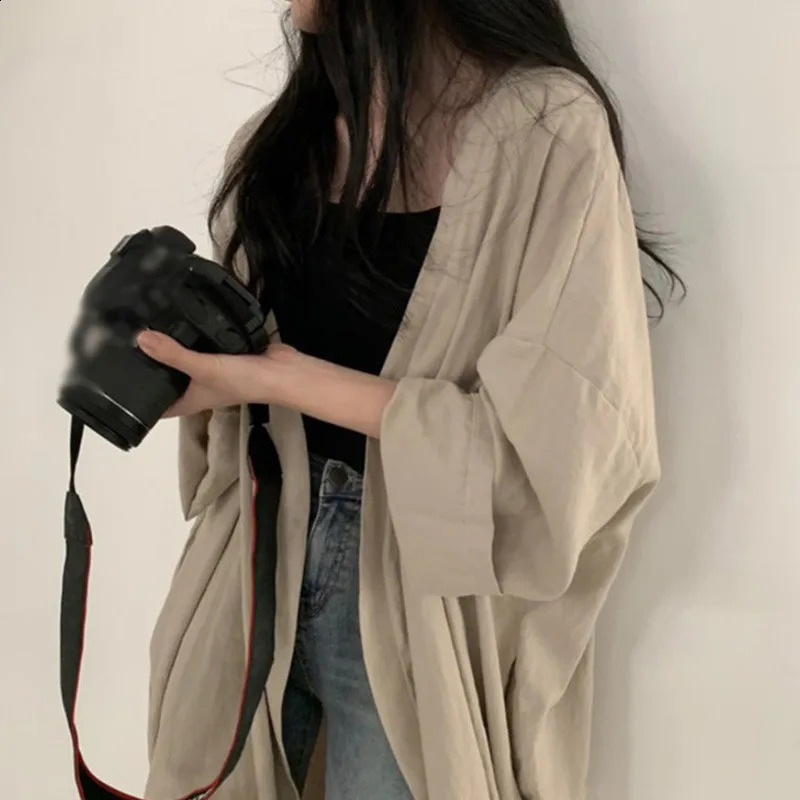 Version coréenne d'été Loose Fit Womens Long Cardigan Couleur solide respirant des vêtements de crème solaire mince-vent-vent 240824