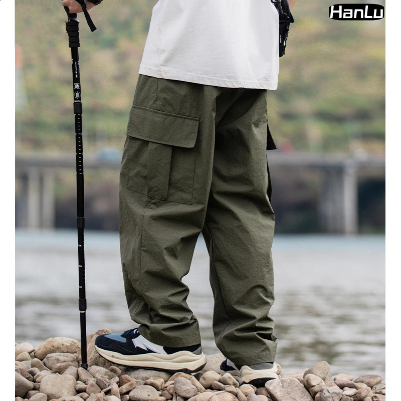 Pantalon de cargaison de cargaison de cargaison de cargaison d'escalade multi-poche pour hommes.