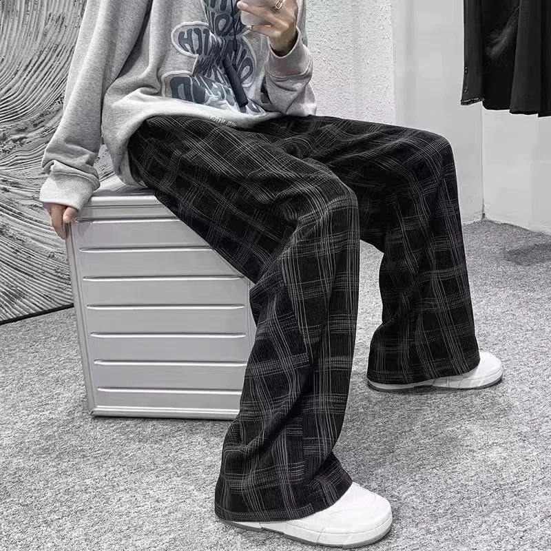 Pantalons en velours côtelé d'automne hommes décontractés plaid pantalon hop mâle mâle pantalon lâche pour l'homme 240824