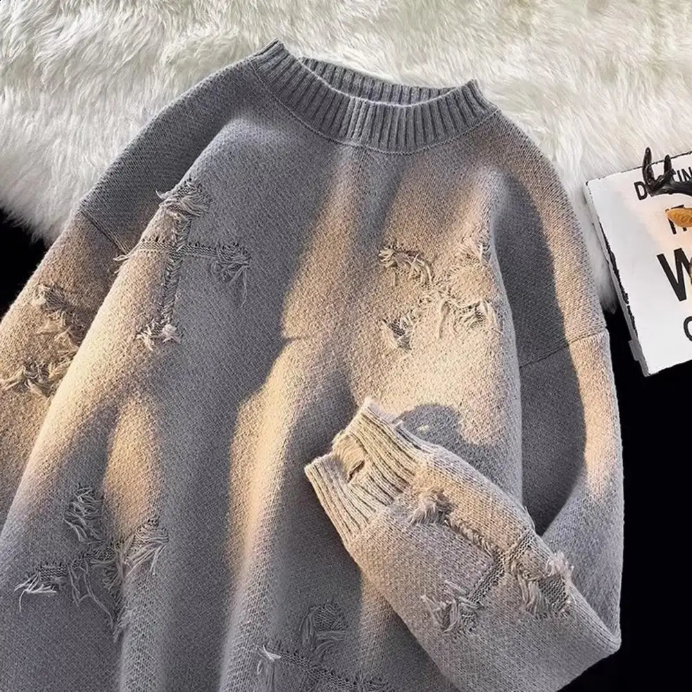 Versatile long sleeved sweater with retro inspiration mens knitted loose fitting sweater with torn tassel cross pattern suitable for autumn and wint
