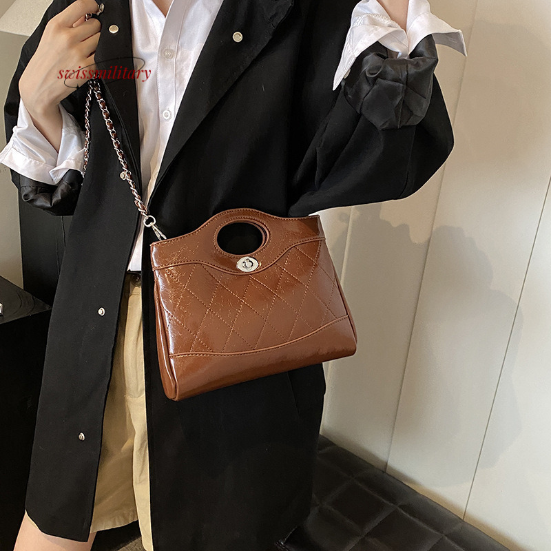 Sac à main de la navette suisse pour les femmes, niche, haut de gamme haut de gamme à la mode, 2024 Nouveau sac de chaîne de grille de diamant si