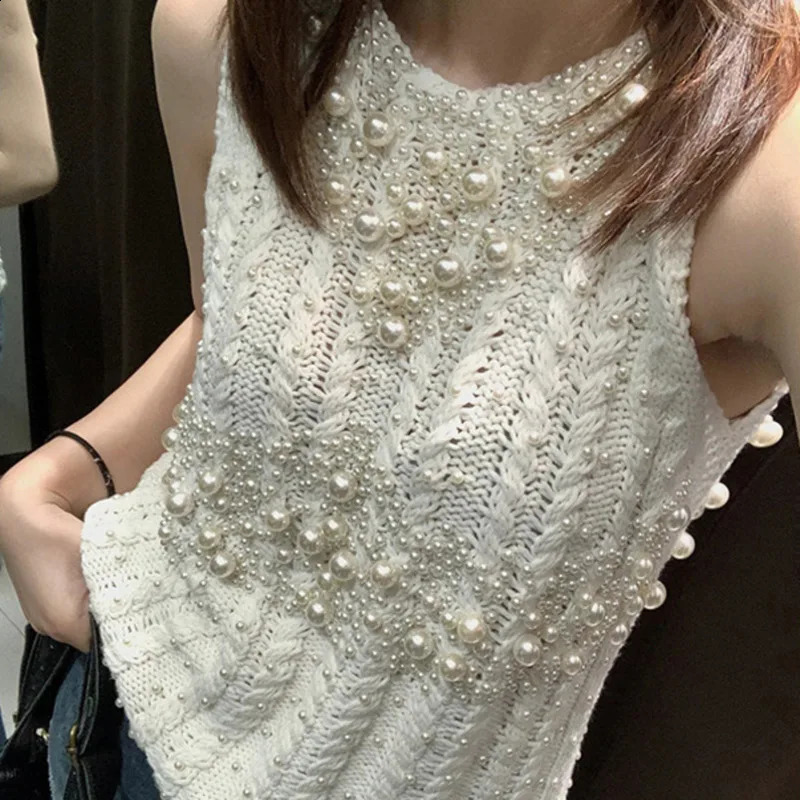 Womens white pearl thin sweater vest knitted casual loose polo collar sleeveless selling fashion sexy style hollow cardigan 240827