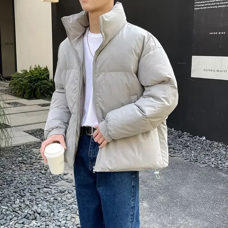 Hommes hiver épaissi coupe ample décontracté Style coréen couleur unie col montant veste bouffante Simple coton rembourré manteau 240828
