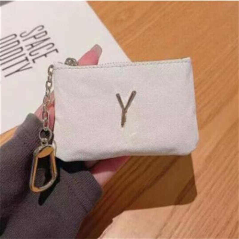 Détenteurs de cartes de créateur de mode portefeuille Pu Leather Passeport Couverture Business Mini Pocket Travel Men Femmes Sacs Chaîne Pourse