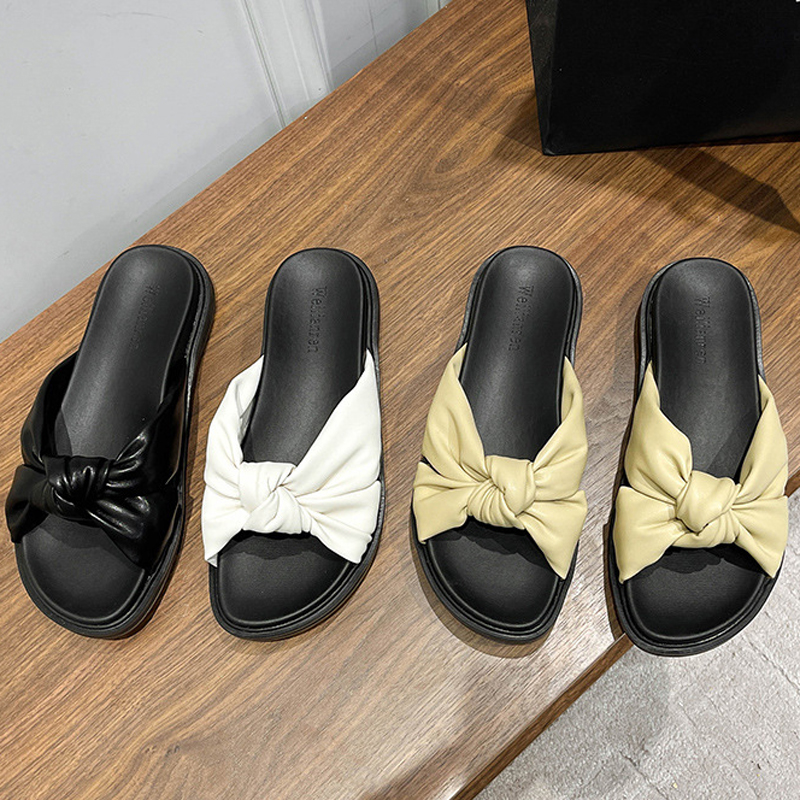 2025 Chaussures en caoutchouc estivales Mesdames épaissis plate-forme semet glissades en cuir soft twist bow greffères femme confortable flipps s
