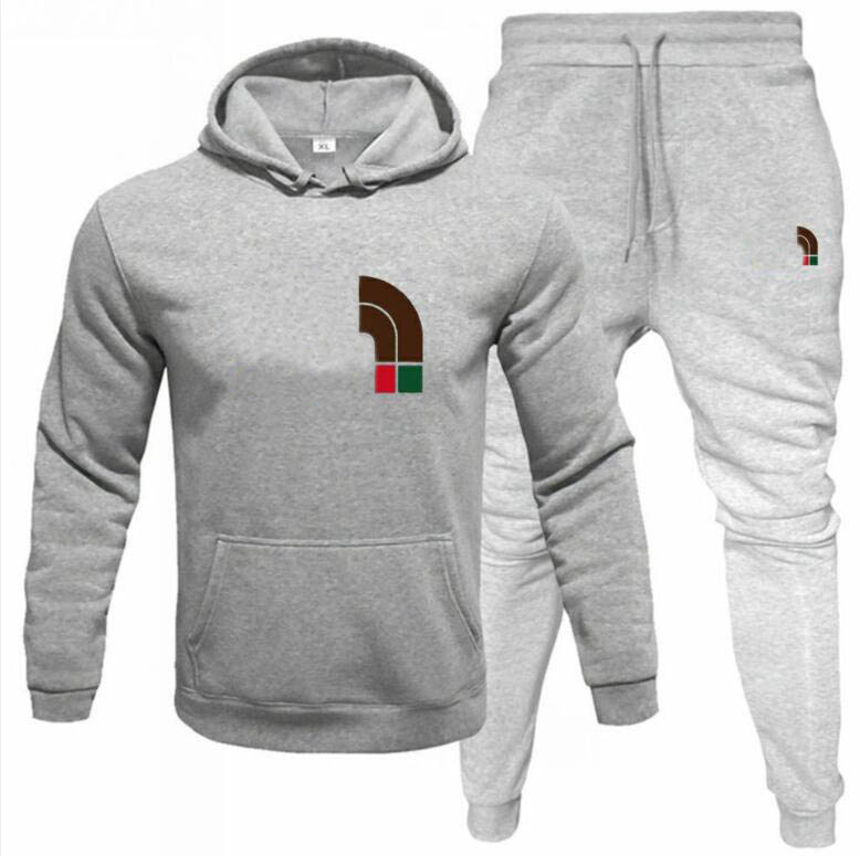 Vêtements homme à rayures créateurs survêtement veste femme ou hoodie ou pantalon sweat à capuche sportswear costume couple décontracté