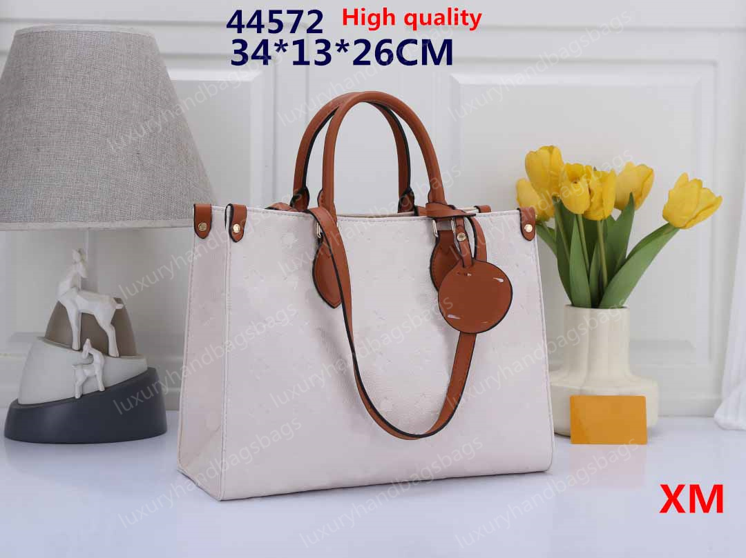 Designer Femmes PM Sacs à provisions Pu en cuir Sacs Wild at Heart Backsing Luxury Handbag Purse Tote Sacs