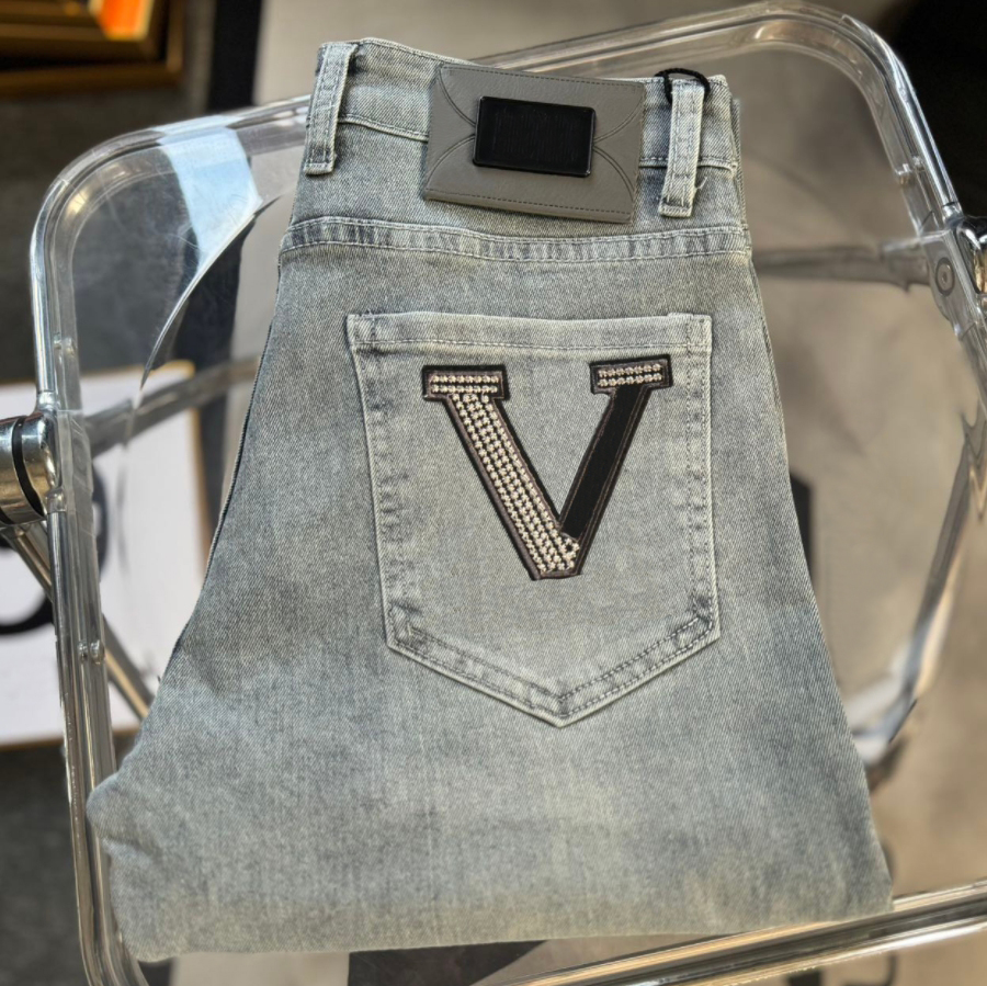 Luxury women's designer jeans paired with ultra soft cotton washed denim embossed high elastic pants-image-977373159