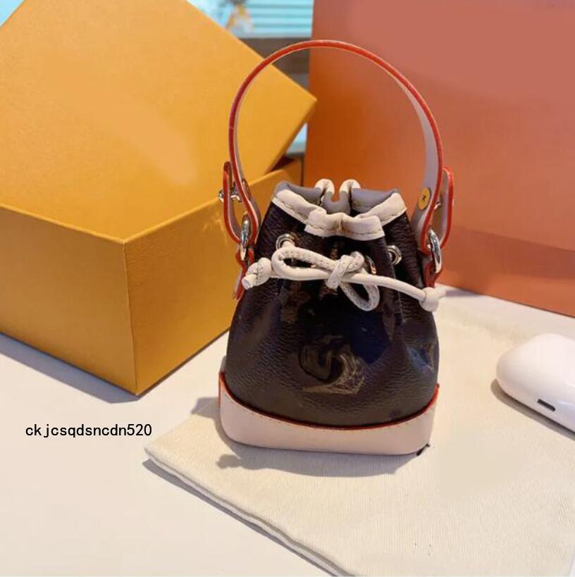 Porte-clés en cuir populaire haut de gamme pour hommes et femmes, cadeau de mode, breloque de sac classique, UU1