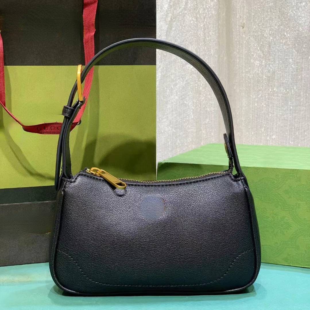 Femmes de créateurs en cuir réels sacs à main sous les bras à main 739076 Brots de marque de luxe Claquettes LADES GADE FORME TOP Handle Sacs de