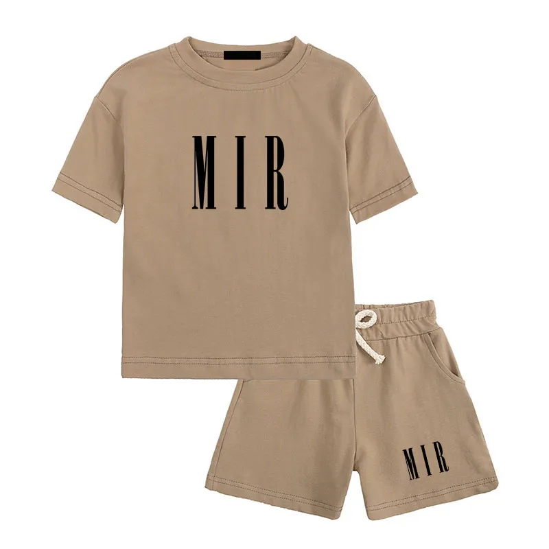 Plusieurs couleurs pour enfants ensembles d'été rond des garçons de boys survêtements de mode Fashion Girls Cotton Tshirts Shorts deux pièces Vêt