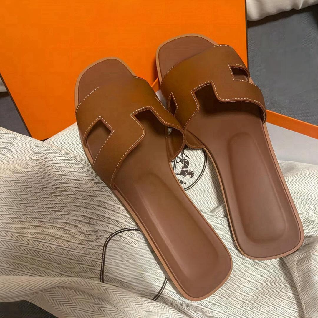 Pantoufles de mode Femmes Sandales de créateurs pour femmes pantoufle hommes mocassins décontractés chaussures de plage en plein air diapositives