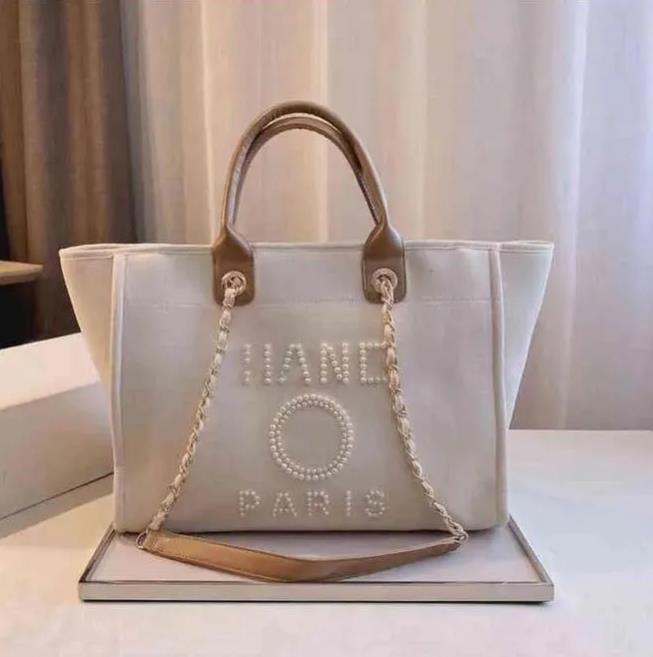 2024 Designer Large capacity Beach Bags Luxury pearl tote seaside ladies shoulder handbags shopping bag Fashion Duffel bags handbag wallet-image-960770928