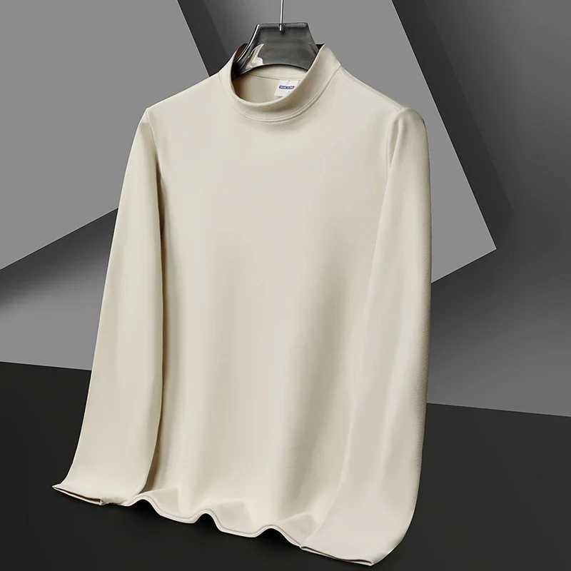 Nouveau T-shirt de couleur unie décontracté et à la mode pour hommes avec col rond à manches longues en velours haut polyvalent chaud et conforta