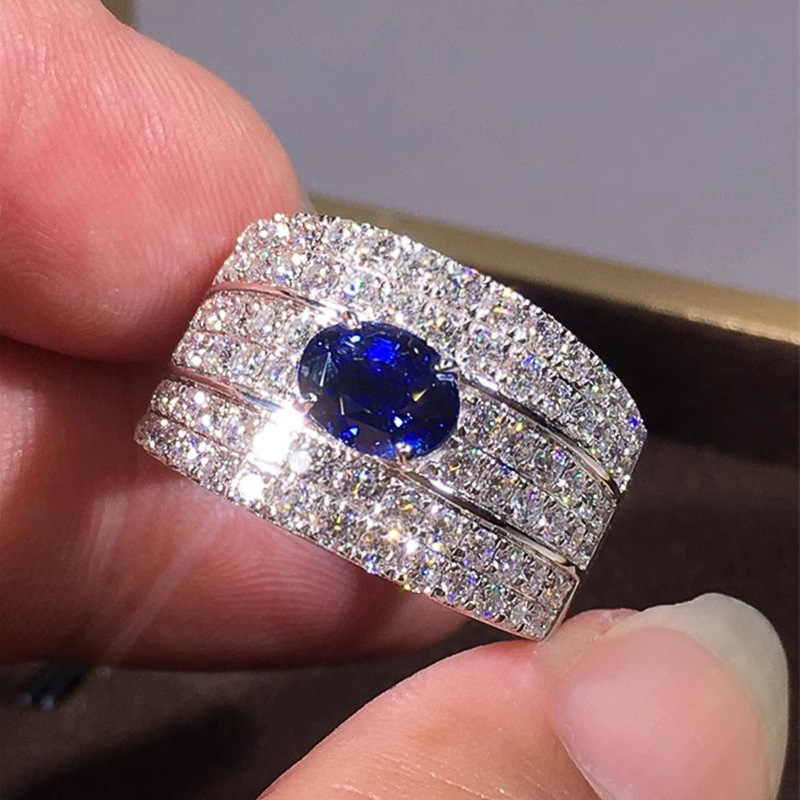 Choucong Sparkling Luxury Jewelry Wedding Rings 925 Sterling Silver Oval Cut Blue Sapphire Three Rows Pave White Zircon Party Eternity Women Brid