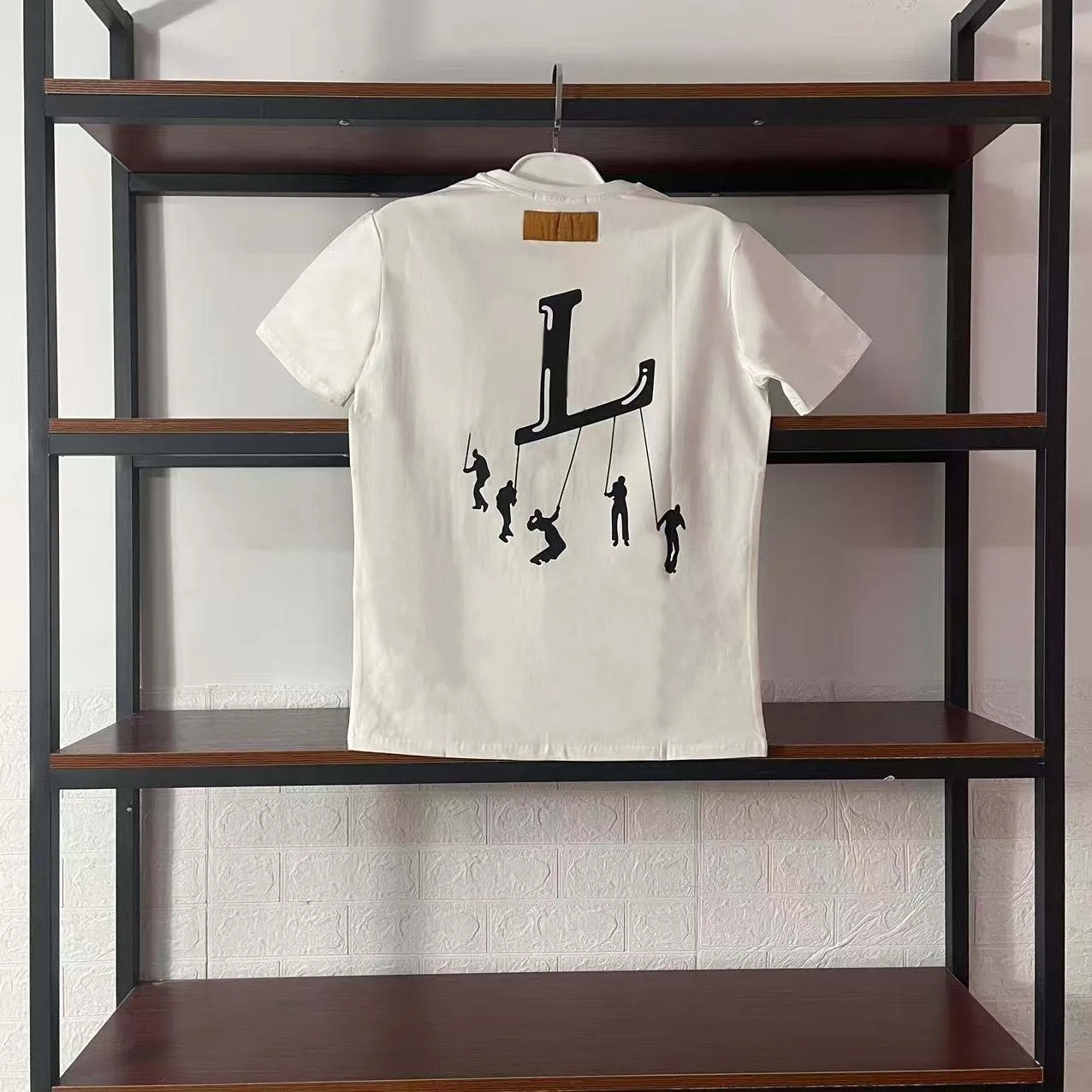 2023 Designers pour hommes T-shirt mande Polos Tshirts avec lettres Imprimer les manches courtes Shirts d'été Men de tas lâches