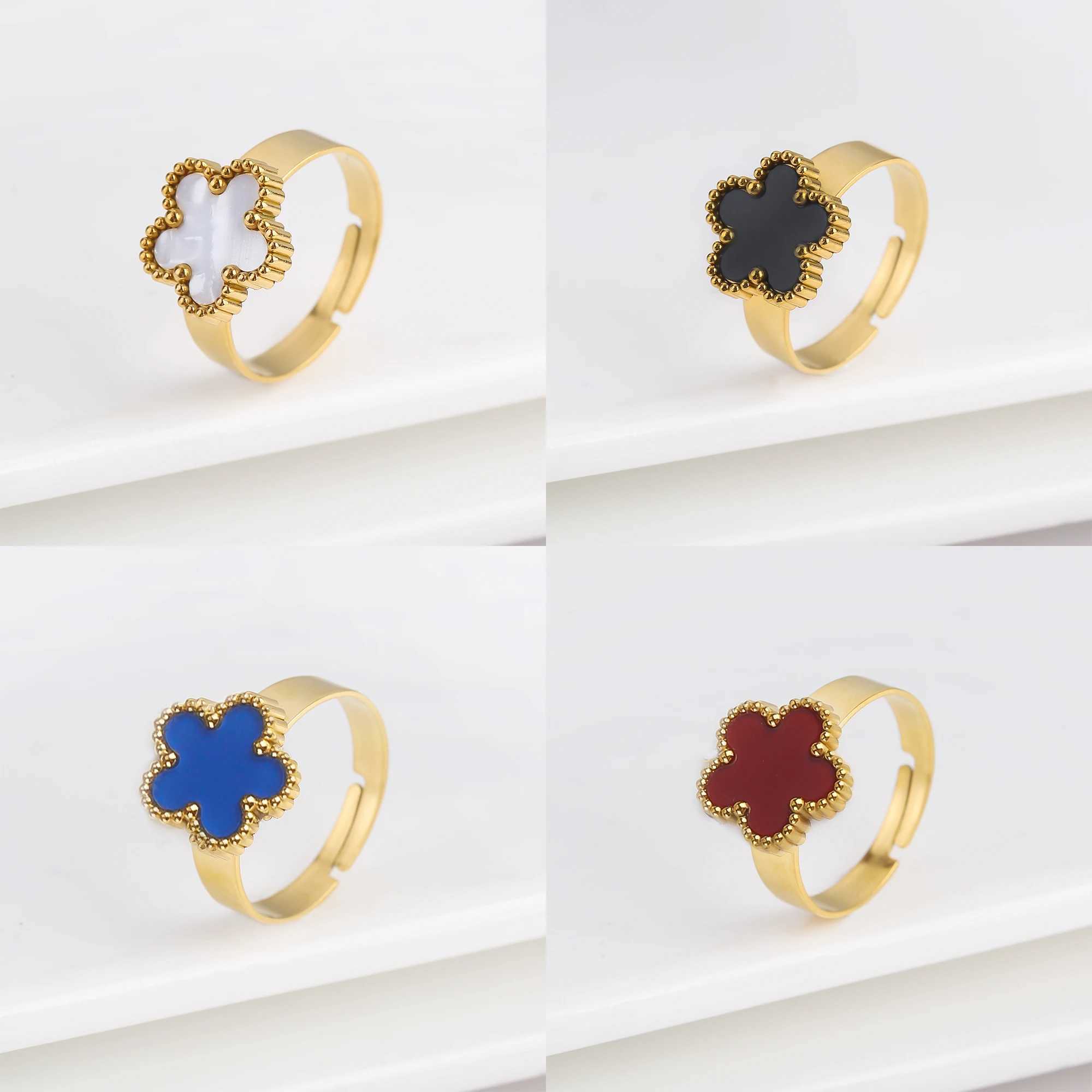 Anneaux de bande Banque en acier inoxydable de haute qualité Acrylique cinq feuilles fleur ouverte Bague de fête simple Bijoux de doigt du doigt
