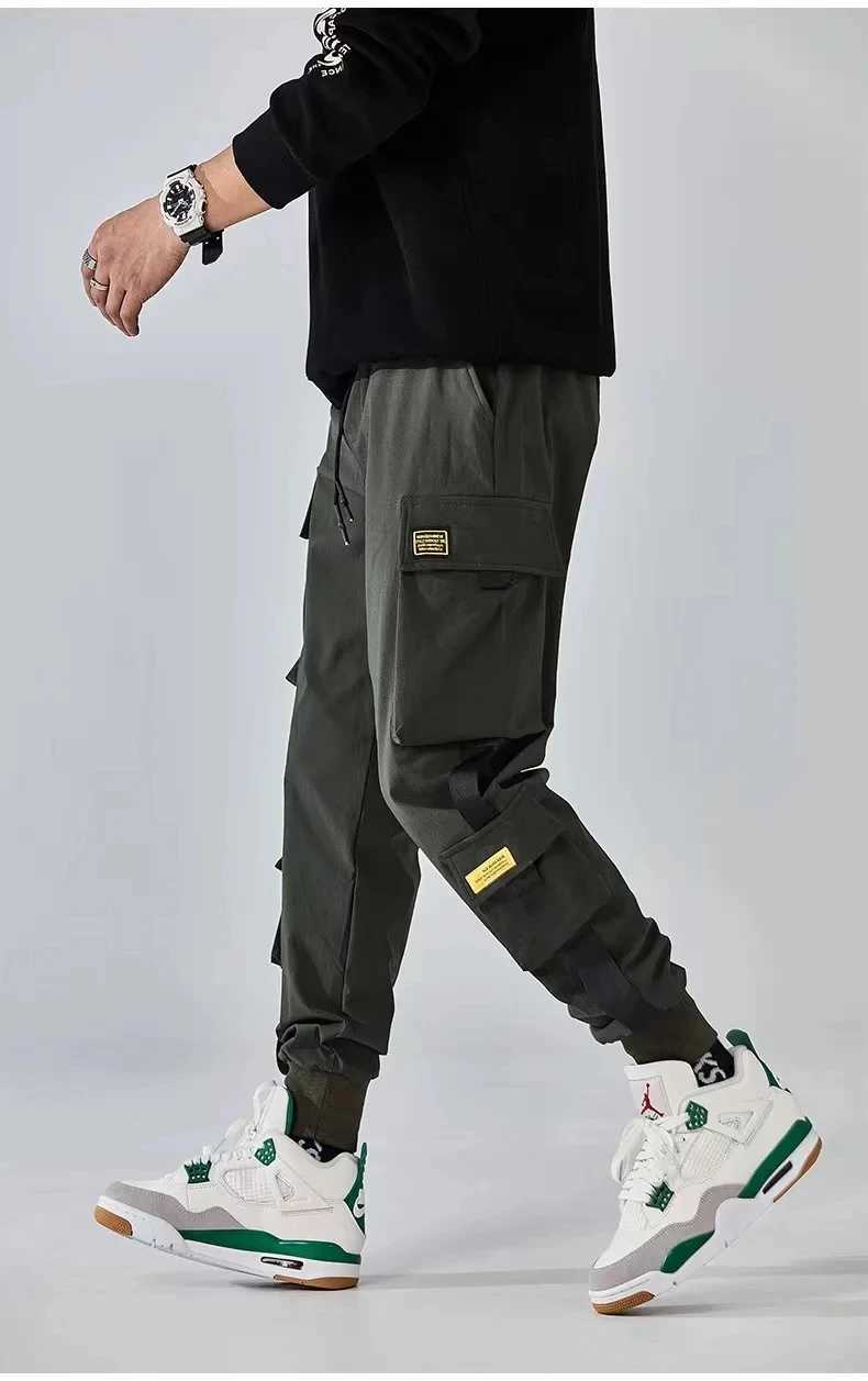 Trendy oversized casual sports pants trendy brand loose leg and plush long pants mens functional er hot work pantsXJ241112